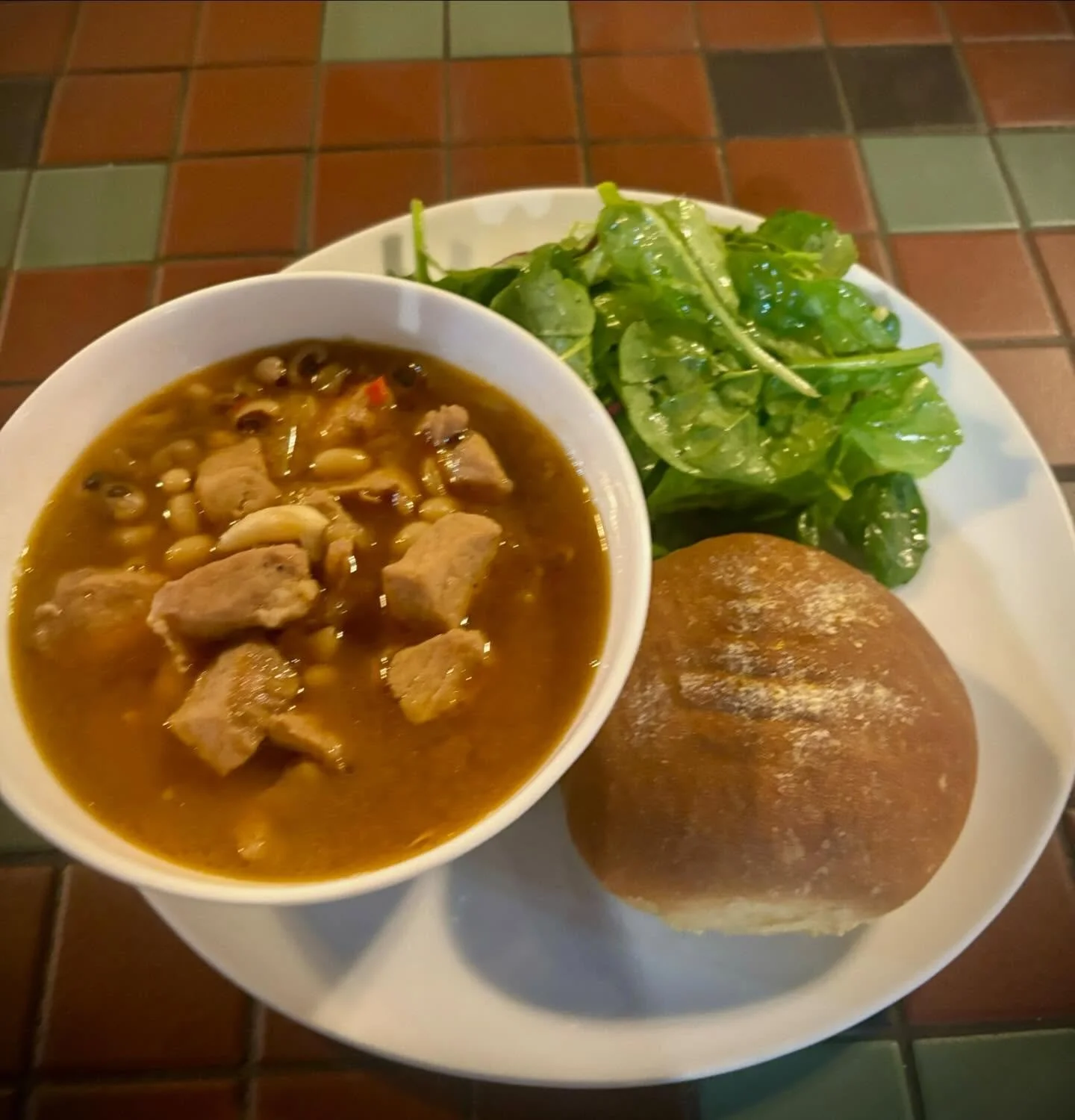 Brown sugar pork and black eyed peas with salad and house made rolls tonight with musical complement by Orion 🫶