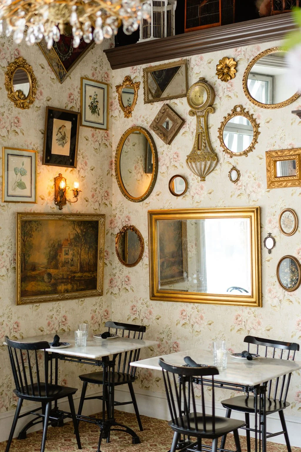 The Tea Room's patterned walls and gilt mirrors