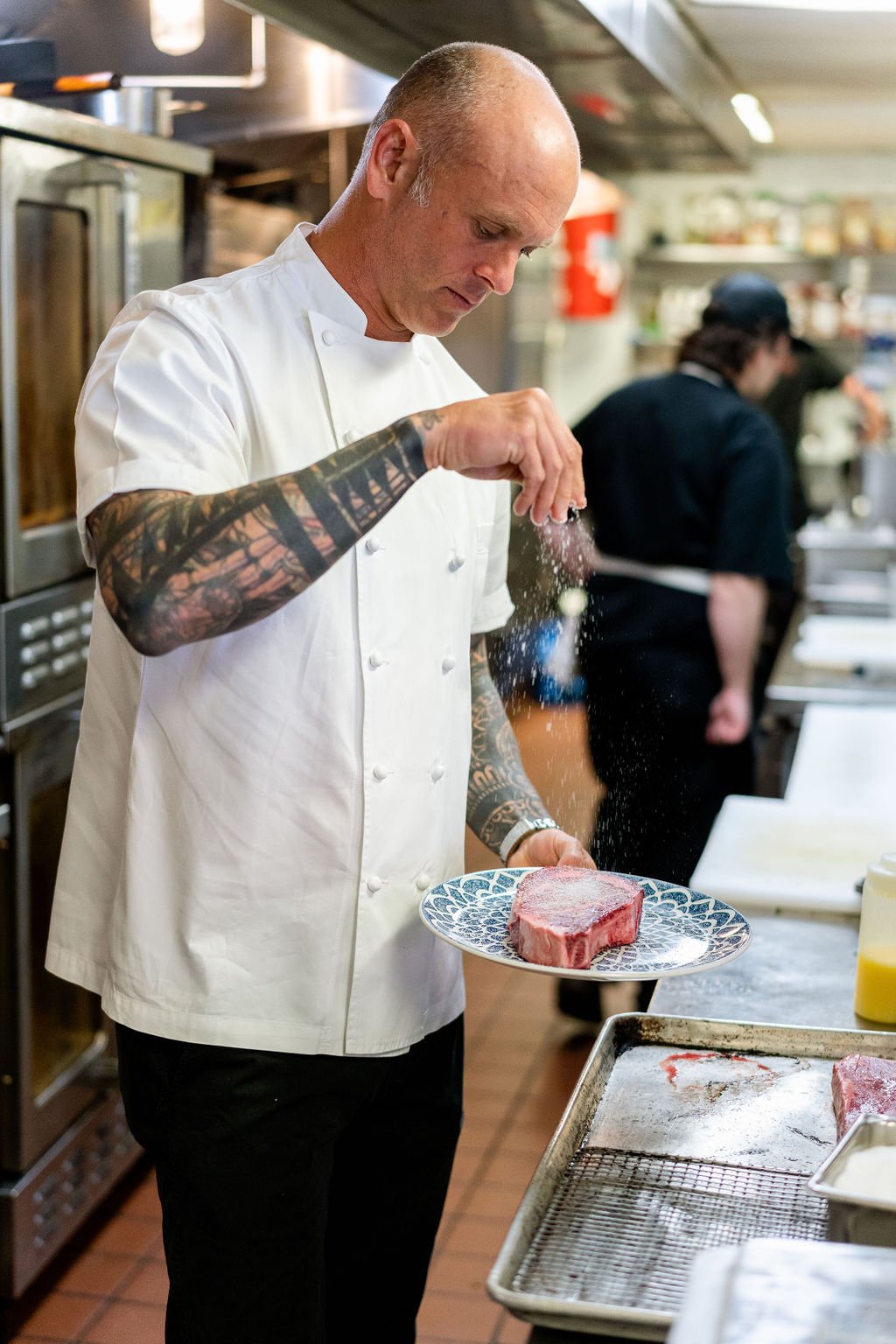 Chef James Sprinkling Salt on Steak.jpg