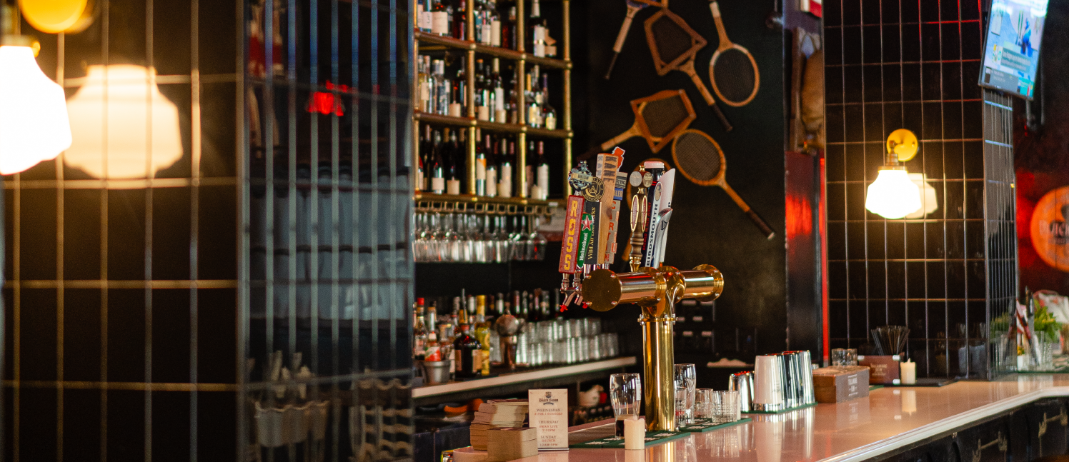 Black Swan Side view of Bar top and Beer Tap Handles.png