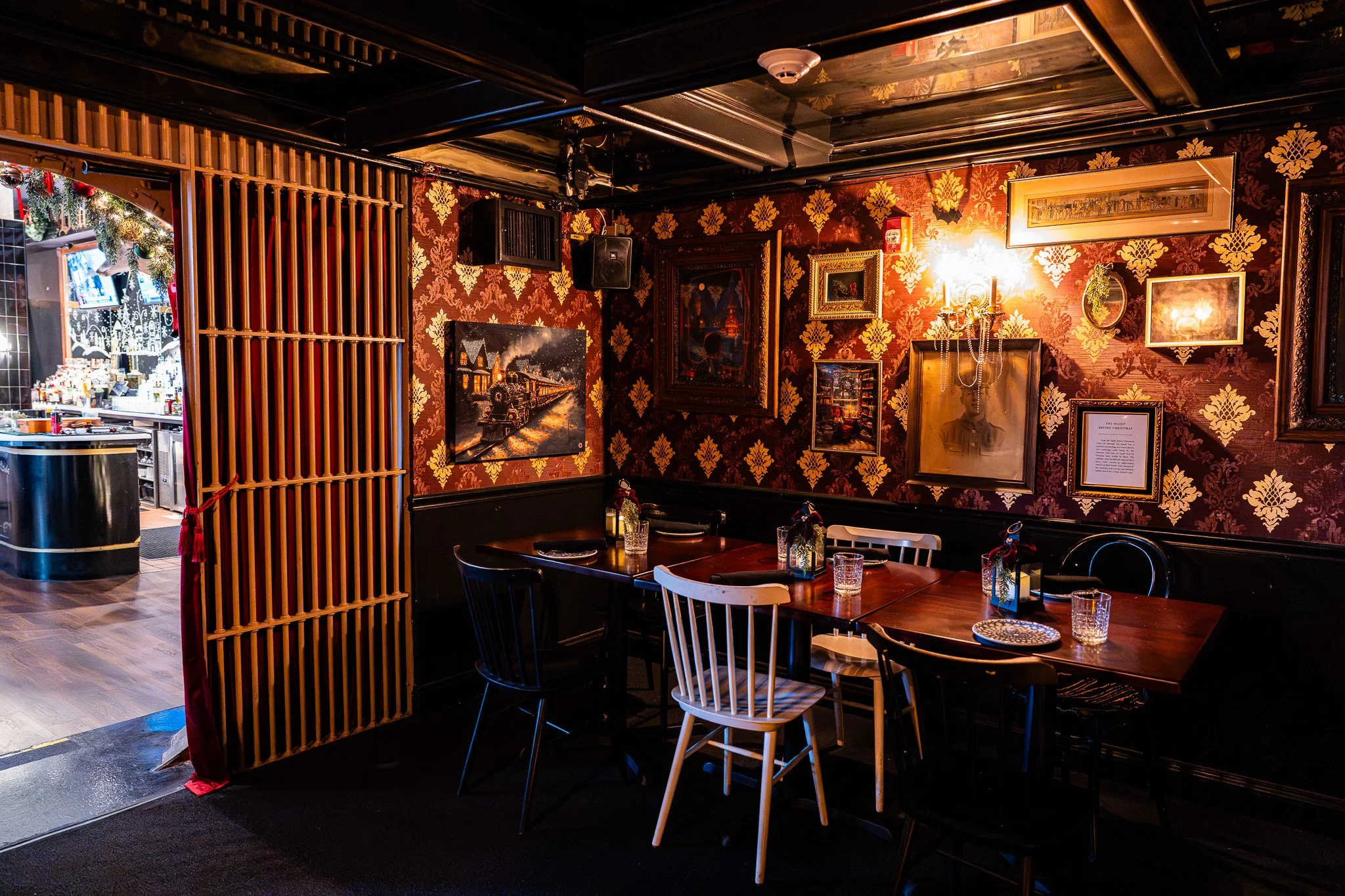 The Black Swan's warmly lit, richly decorated dining room