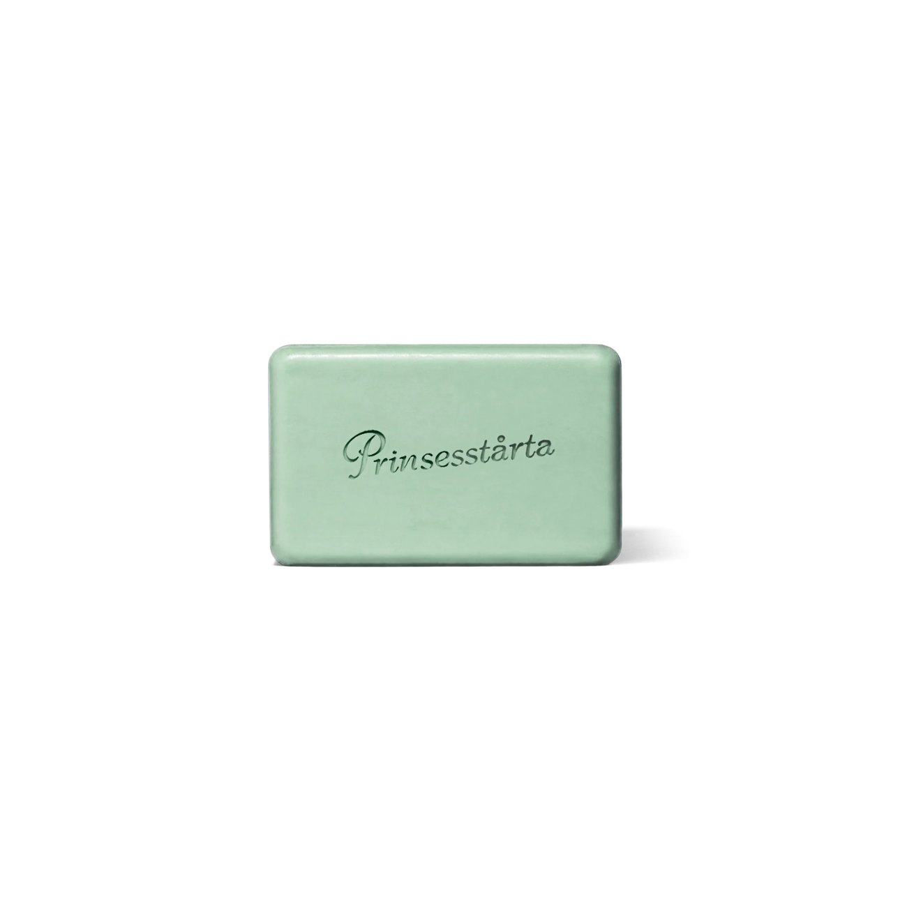 Flamingo Estate Prinsesstarta Milk Bar, a light green bar of soap with the word "Prinsesstarta" etched into it in a script.