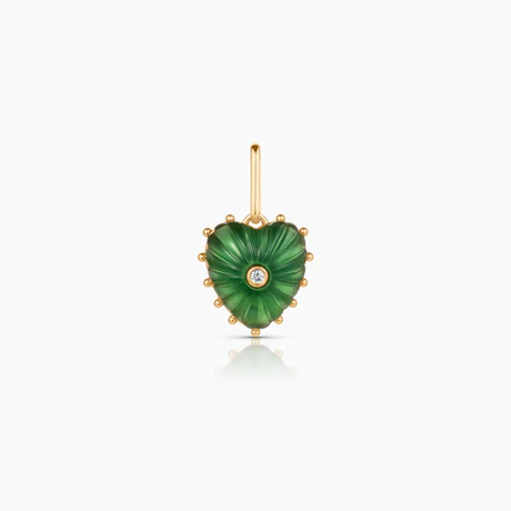The Thatch Jade Heart Charm, a jade heart-shaped charm with a sparkling stone in the center and 14K gold plated details.