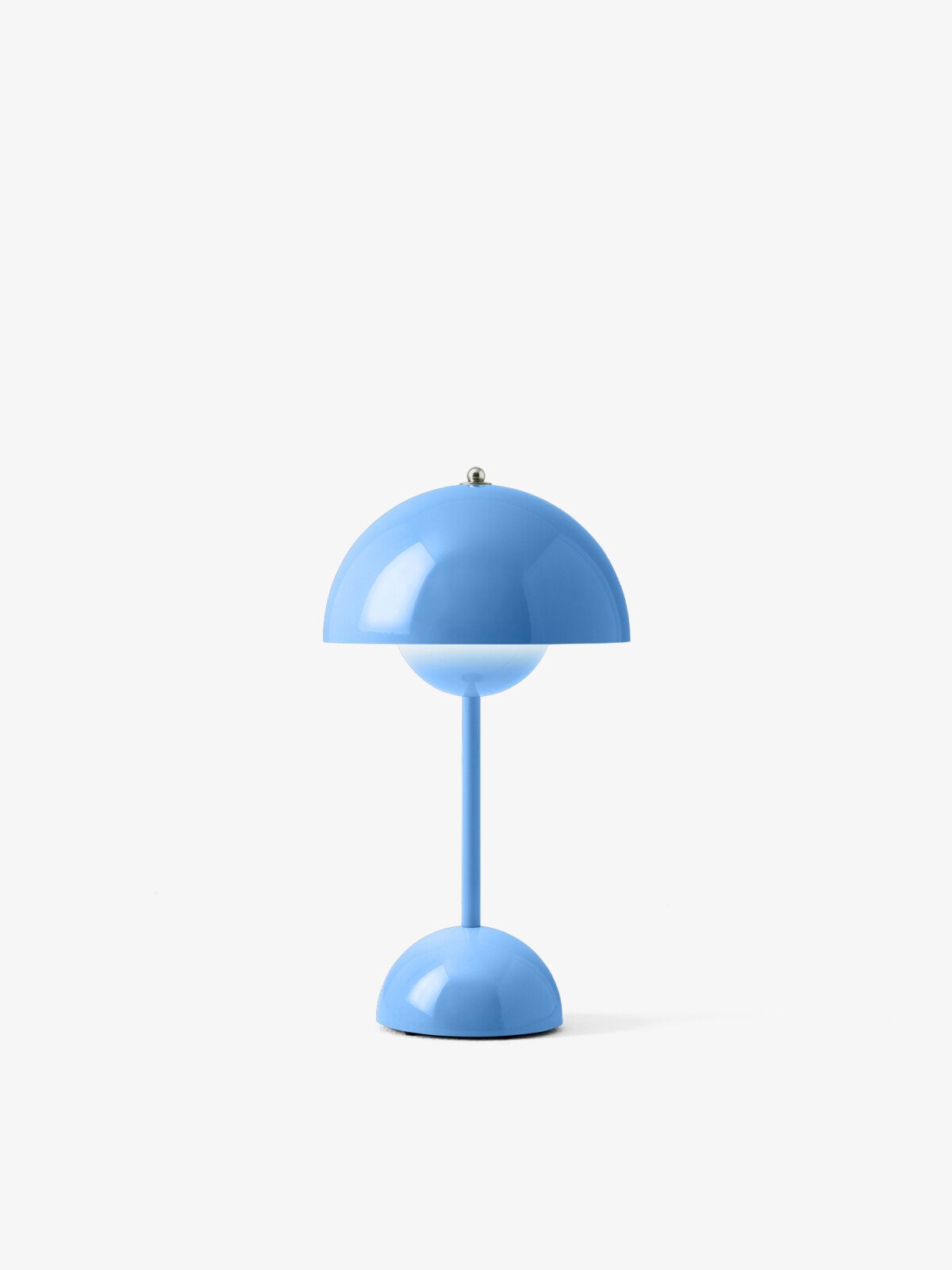 A bright blue Flowerpot lamp with a domed shade by &Tradition.
