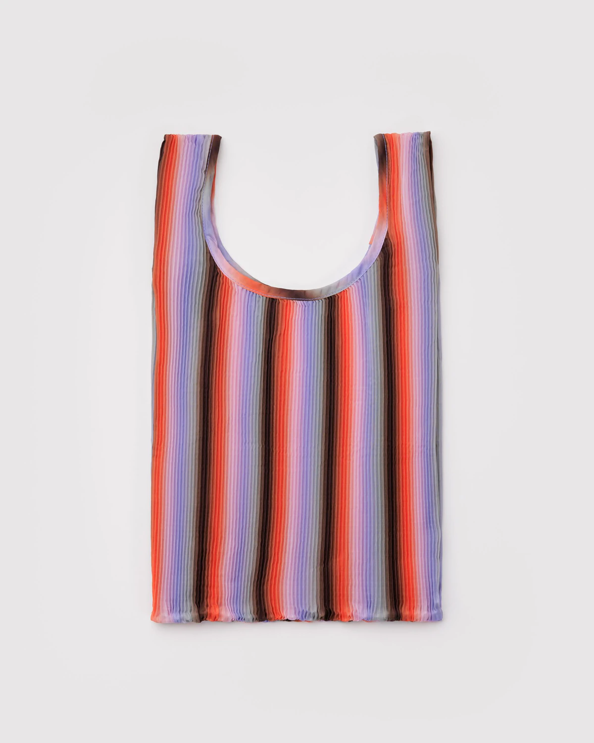 Baggu Gradient Stripe Baggu, a nylon, pleated, reusable tote with brown, purple, and pink gradient stripes.