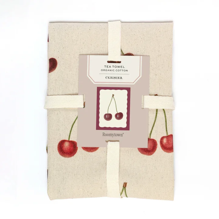 Roomytown Cherries Tea Towel, folded and tied with a natural ribbon.
