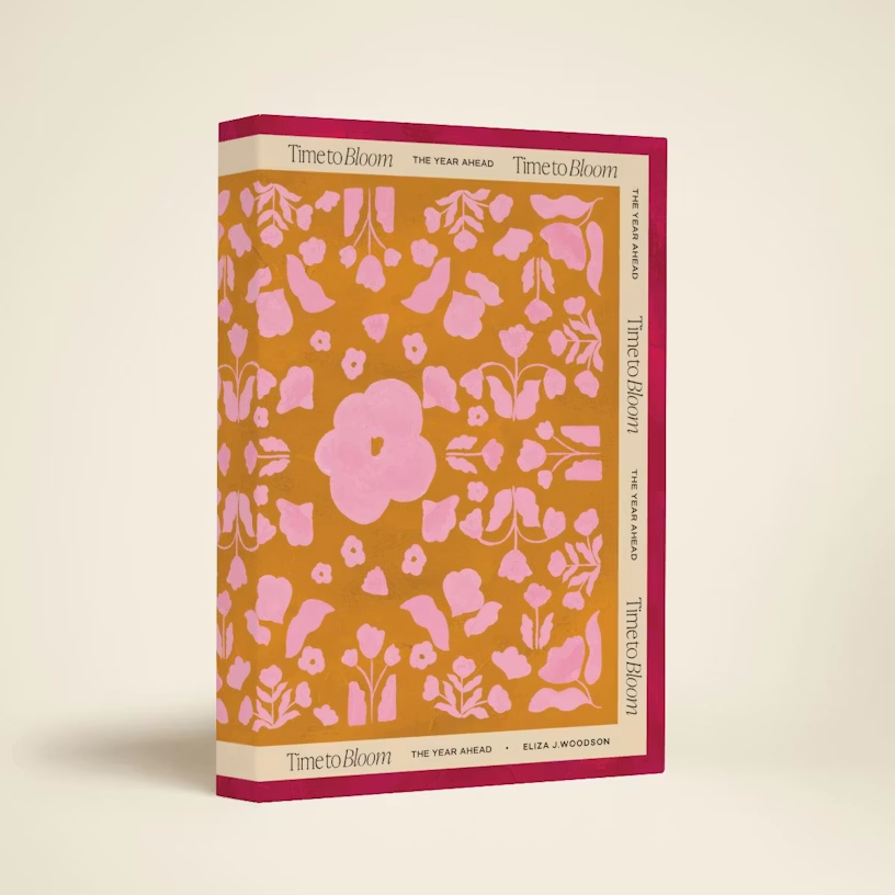 Papier Time to Bloom Daily Planner with a brown and hot pink floral cover and the words "Time to Bloom" around the border.