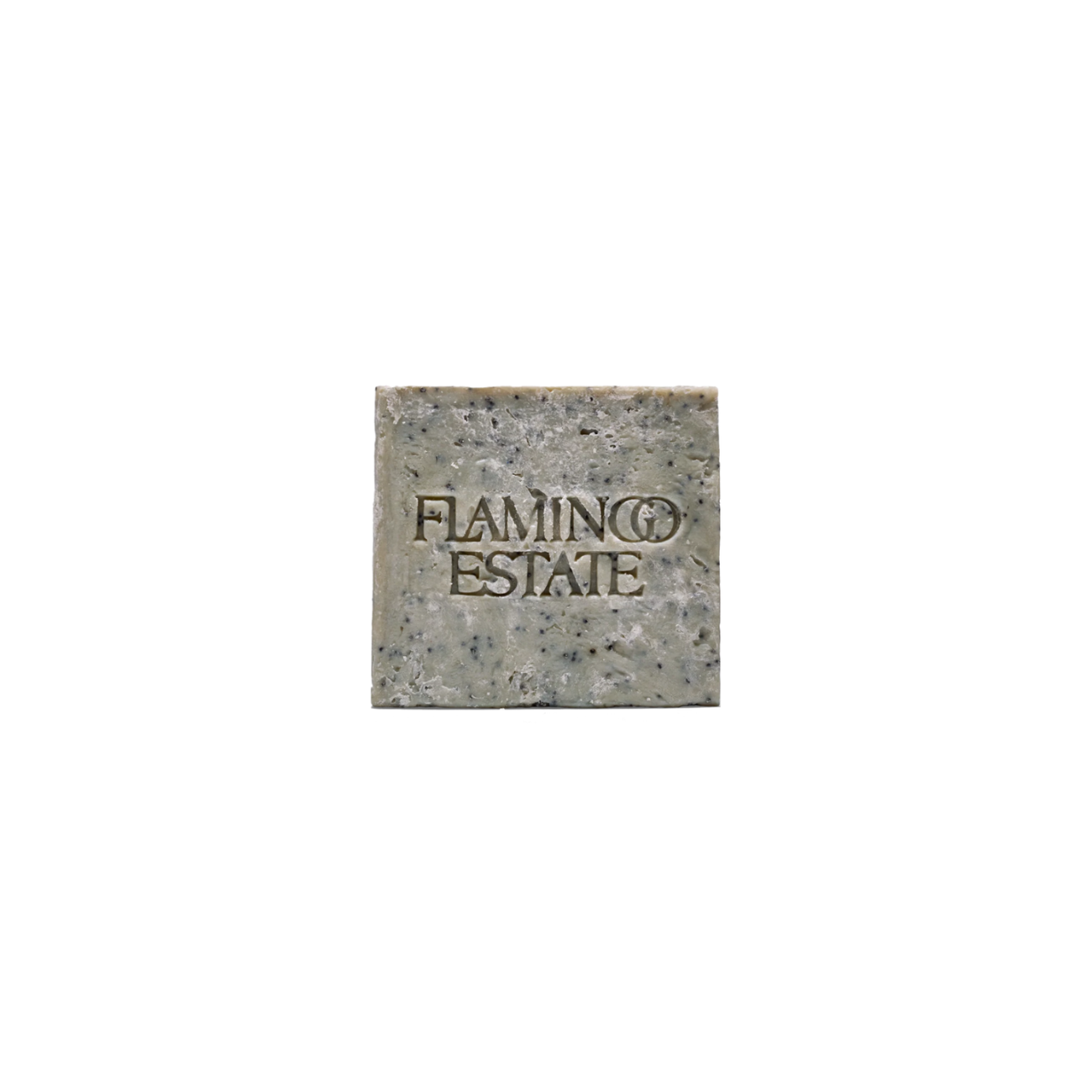 Flamingo Estate Exfoliating Peppermint Soap Brick, a sage green square bar of soap with visible black poppy seeds.