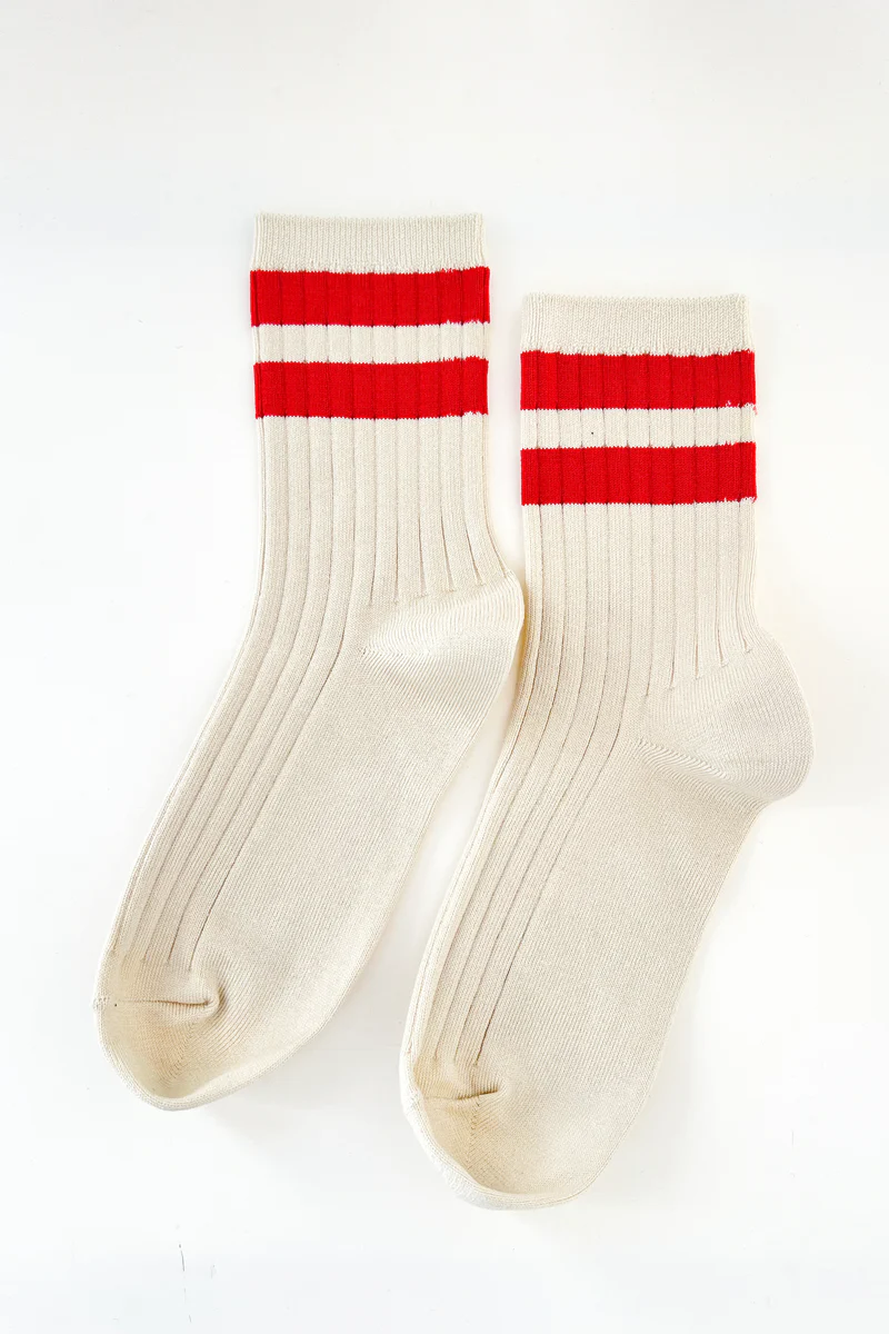 Le Bon Shoppe Red Her Varsity Socks, a ribbed pair of oatmeal colored socks with red striped at the top.