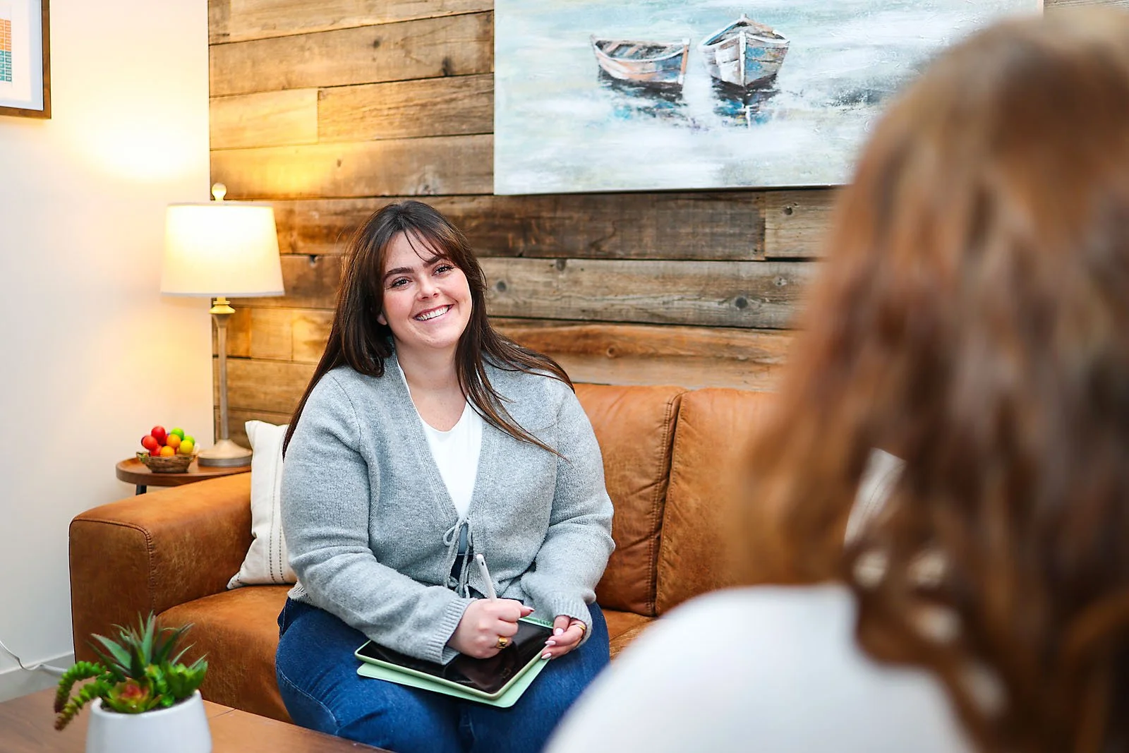Therapist meeting with client for ADHD support for women in Airdrie counselling office