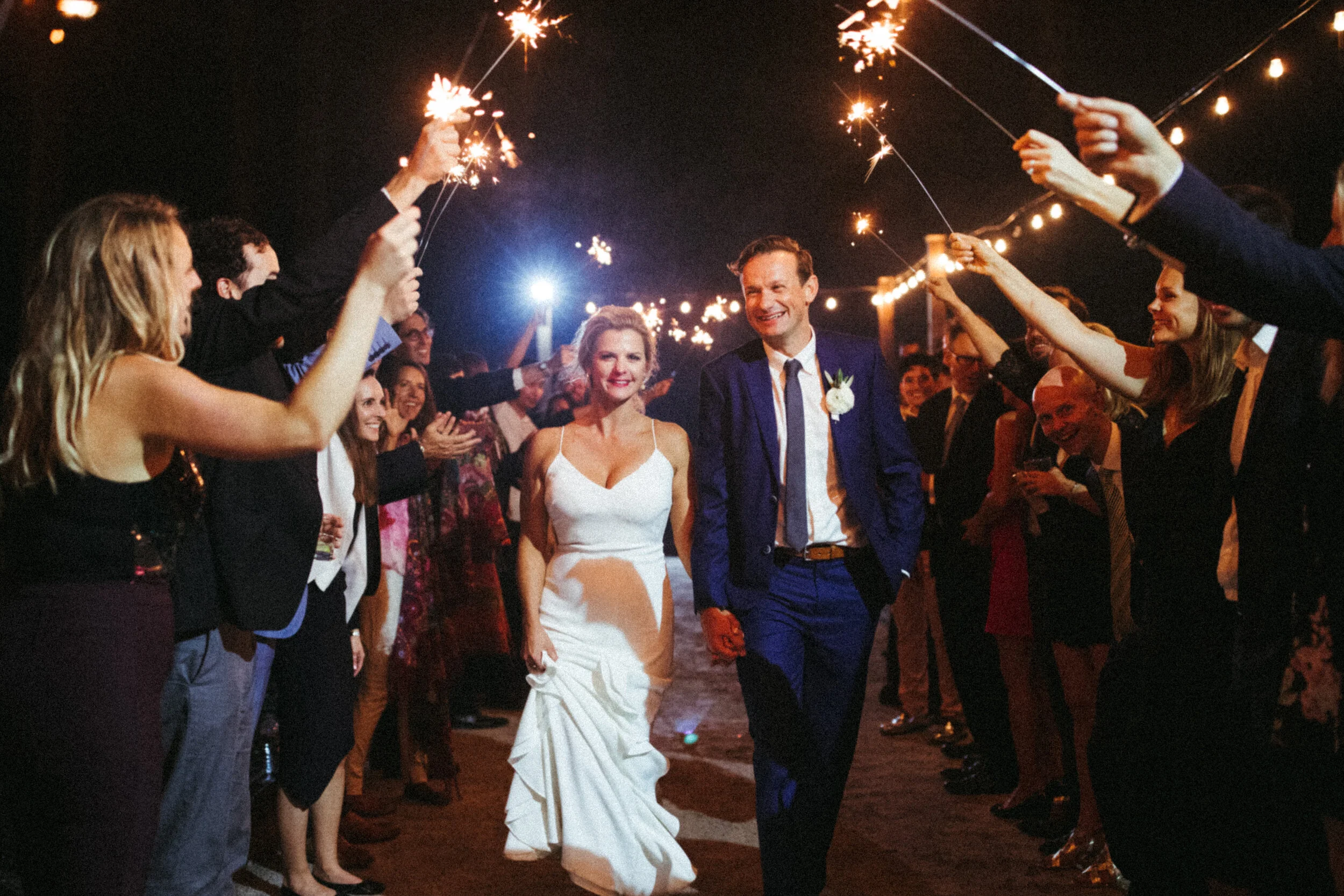 newlywed couple walking through a tunnel of sparkles in Healdsburg San Francisco Sonoma Napa Mendocino Big Sur Joshua Tree California wedding and elopement photographer Super 8 Polaroid film video by Andrea Vodickova
