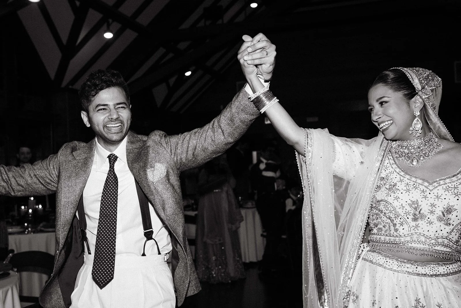 Indian couple walking into reception in black and white in Brazilian room Berkeley San Francisco California wedding and elopement photographer Super 8 Polaroid film video by Andrea Vodickova