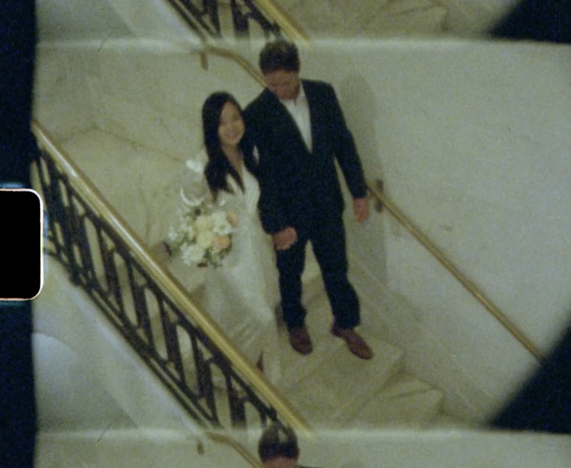 city hall newlywed couple walking down the stairs San Francisco California wedding and elopement photographer Super 8 Polaroid film video by Andrea Vodickova