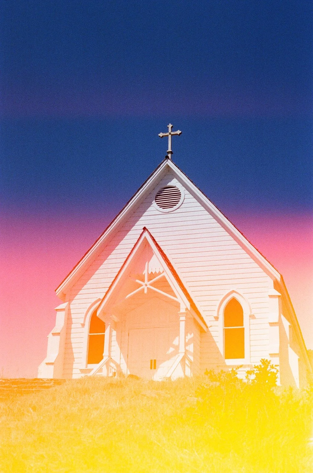 Old St. Hilary's church in Tiburon on film with strong colorful light leak San Francisco Marin County California wedding and elopement photographer film video by Andrea Vodickova