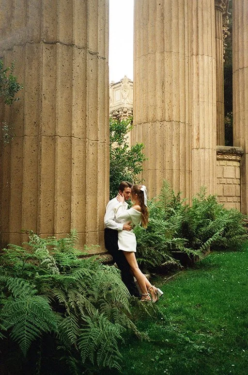 newlywed couple kissing at Palace of Fine Arts San Francisco California wedding and elopement photographer Super 8 Polaroid film video by Andrea Vodickova