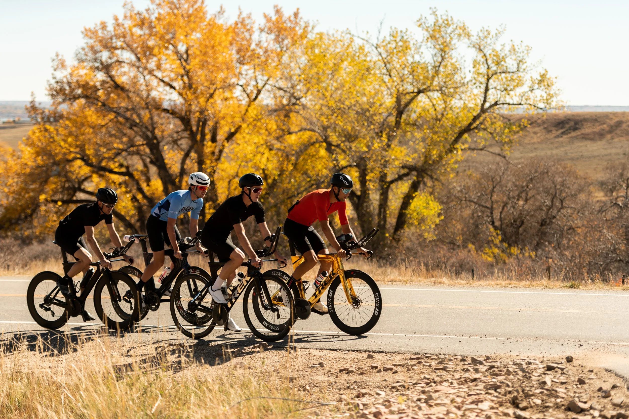 Group of riders on Wove saddles led by Rudy Von Berg in the fall in Boulder