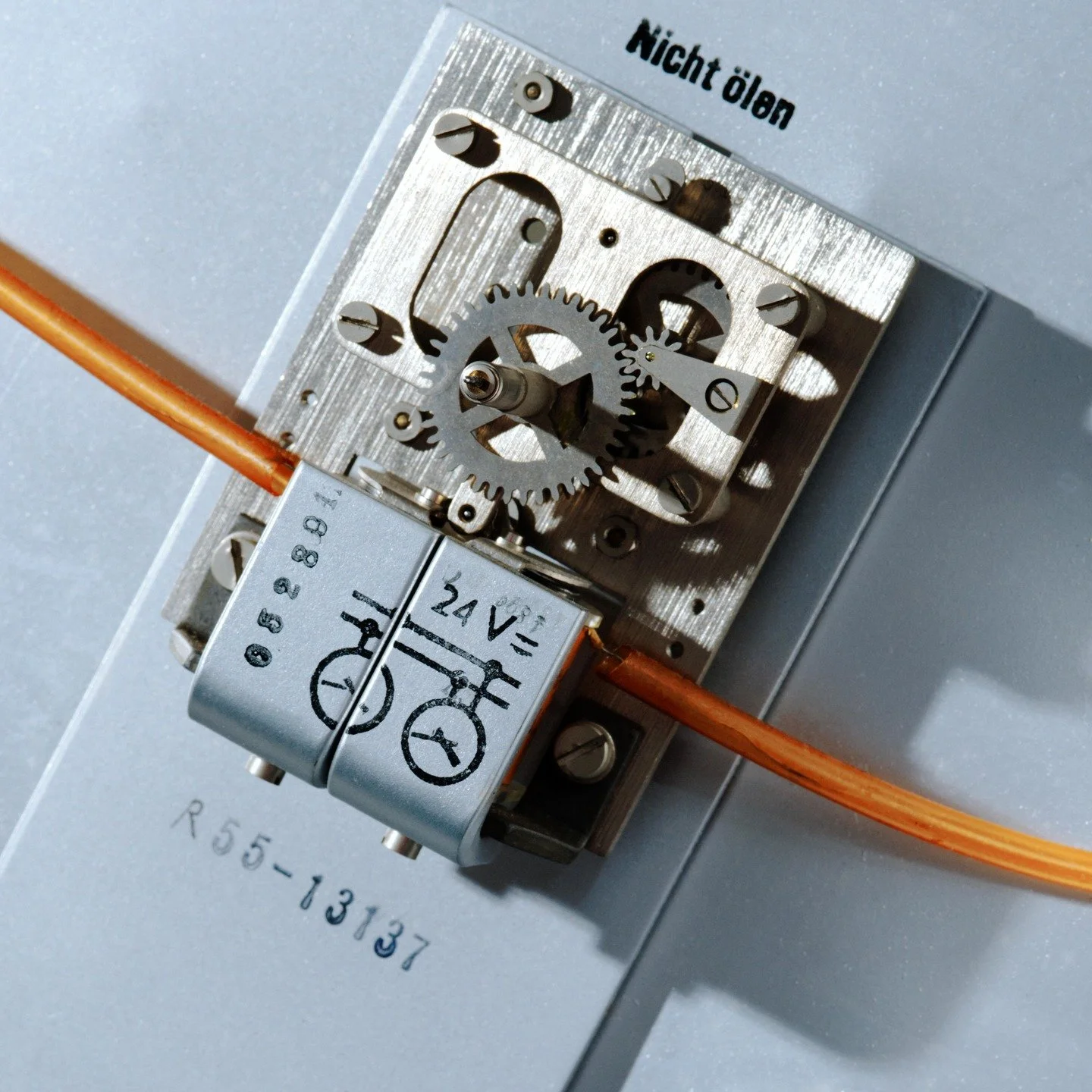 A mid-century (1953) Inducta electric clock mechanism