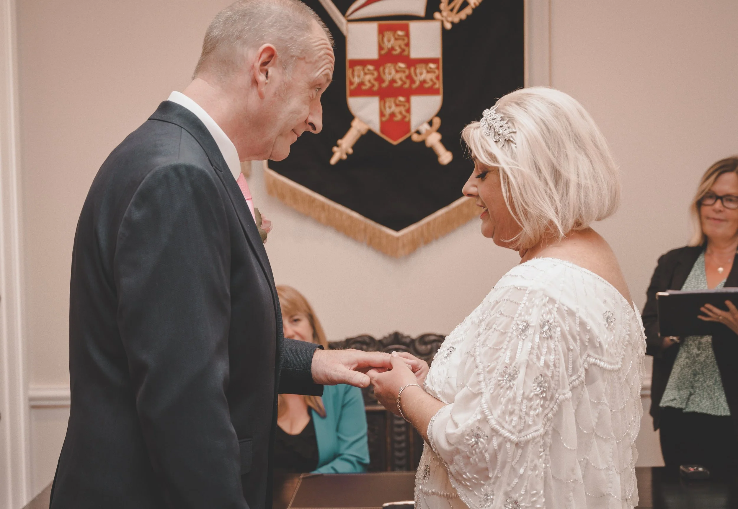 A promise made in ink, now worn on the hand. 

The second step of a beautiful lifetime together. From signing the register to exchanging these tokens of endless devotion, every look shared between them speaks volumes. It&rsquo;s the quiet, steady pro