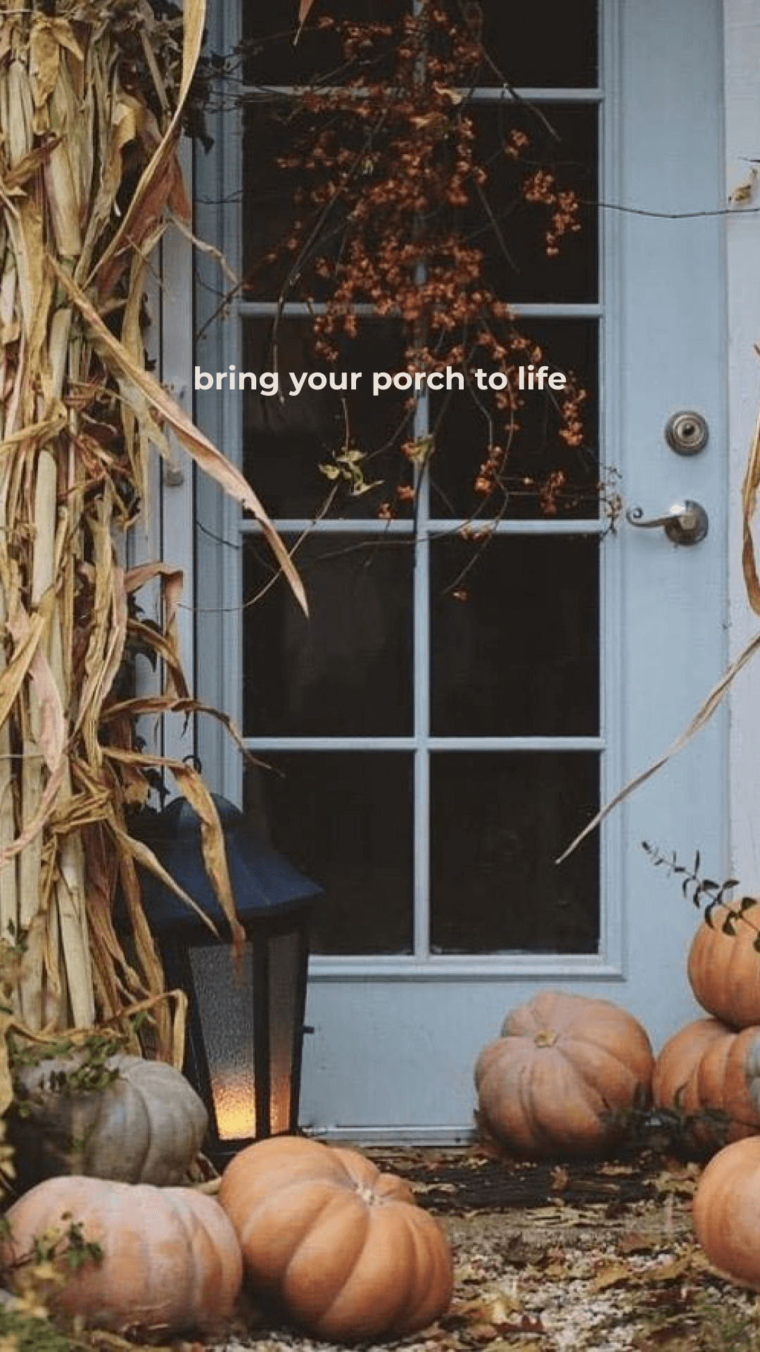 A light blue door adorned with pumpkins and dried corn stalks, and lantern. Text reads “bring your porch to life” evokes a cozy atmosphere on a porch