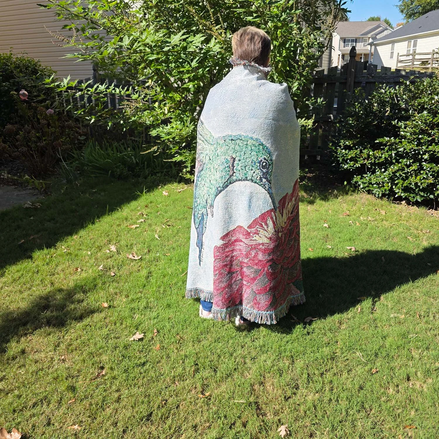 Watercolor-Hummingbird-Woven-Blanket-Zinnia-Outside-Wrapped-Around-Woman-MamaDuck-Art-Beth-Smith.jpg