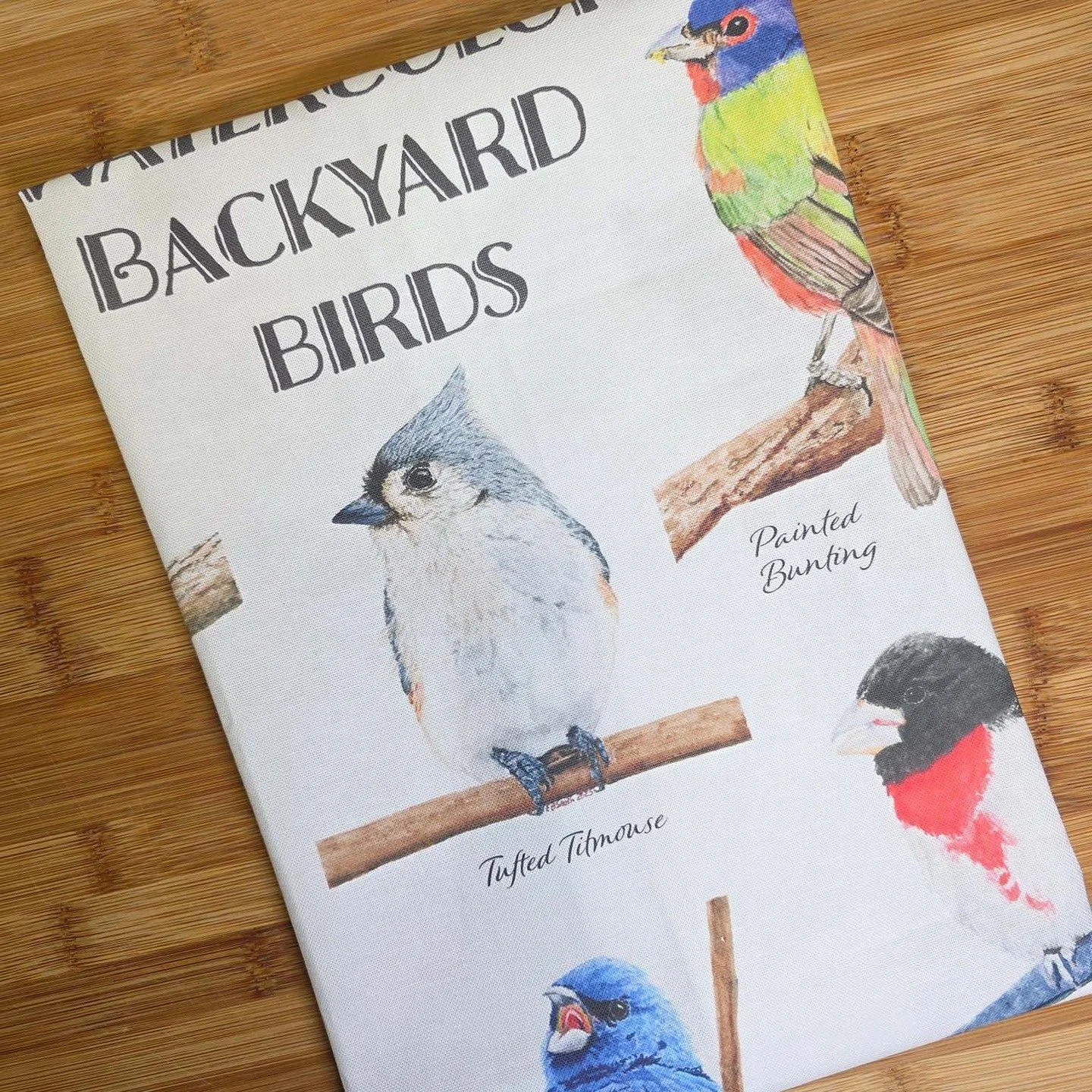 Hooray! It's here and available in the shop on the website! The Watercolor Backyard Birds tea towel is ready to bring some nature-inspired functional beauty into your kitchen. And it makes great gifts too. This tea towel design is composed of my 9 wa