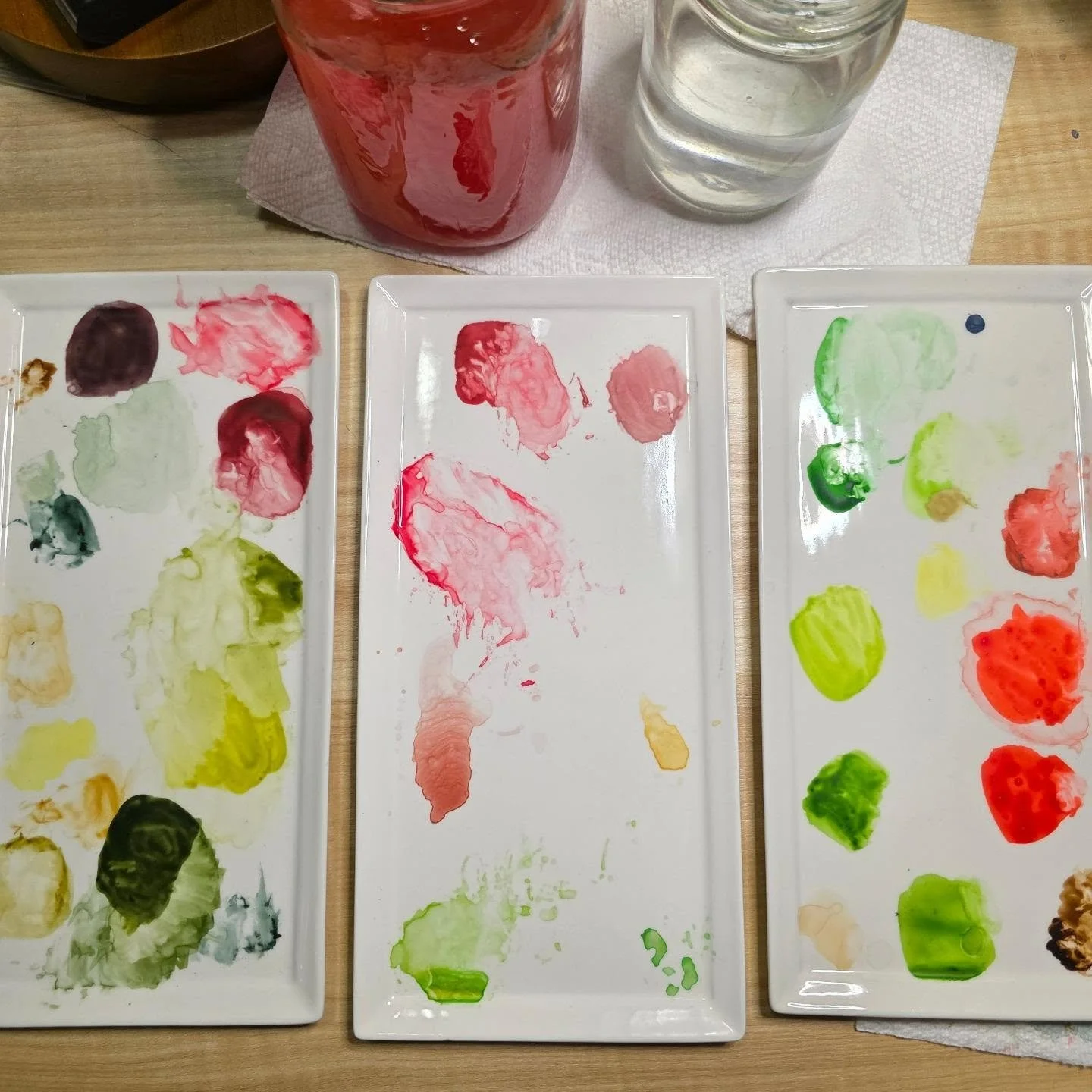 Juggling 3 palettes &amp; 3 holiday paintings in the studio these days. Excited to see the finished work! But for now, there's lots of patience, determination, &amp; joy happening here. Oh &amp; lots of Christmas music playing to set the mood. Who's 