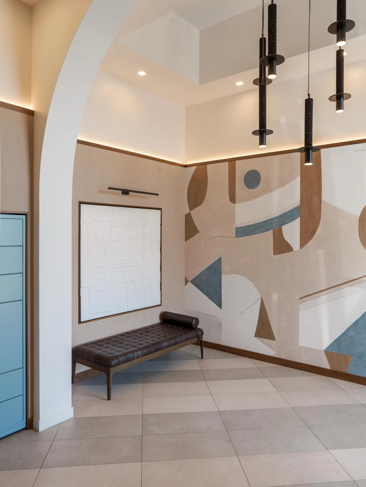 This multi-family residential lobby was designed to feel both elevated and inviting; layered textures, soft curves, and a custom mural that sets the tone the moment you walk in. 

#bilanciainteriors #interiors #community #lobby #modernliving
