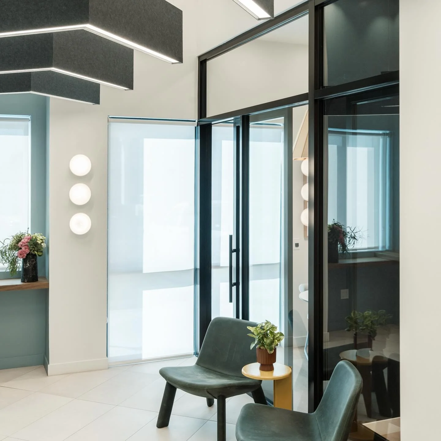 The coworking space at our Virano project makes you go &ldquo;mmhmm&rdquo; when you walk in! We maximized this space to include plenty of seating and two private workspaces for tenants/guests that need some privacy for conference calls or focused mee