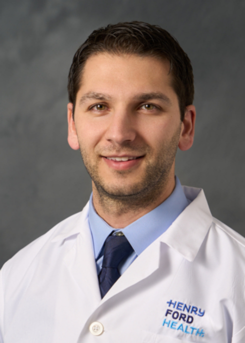 Dr. Sesi, certified ophthalmologist specializing in cataract and refractive surgery