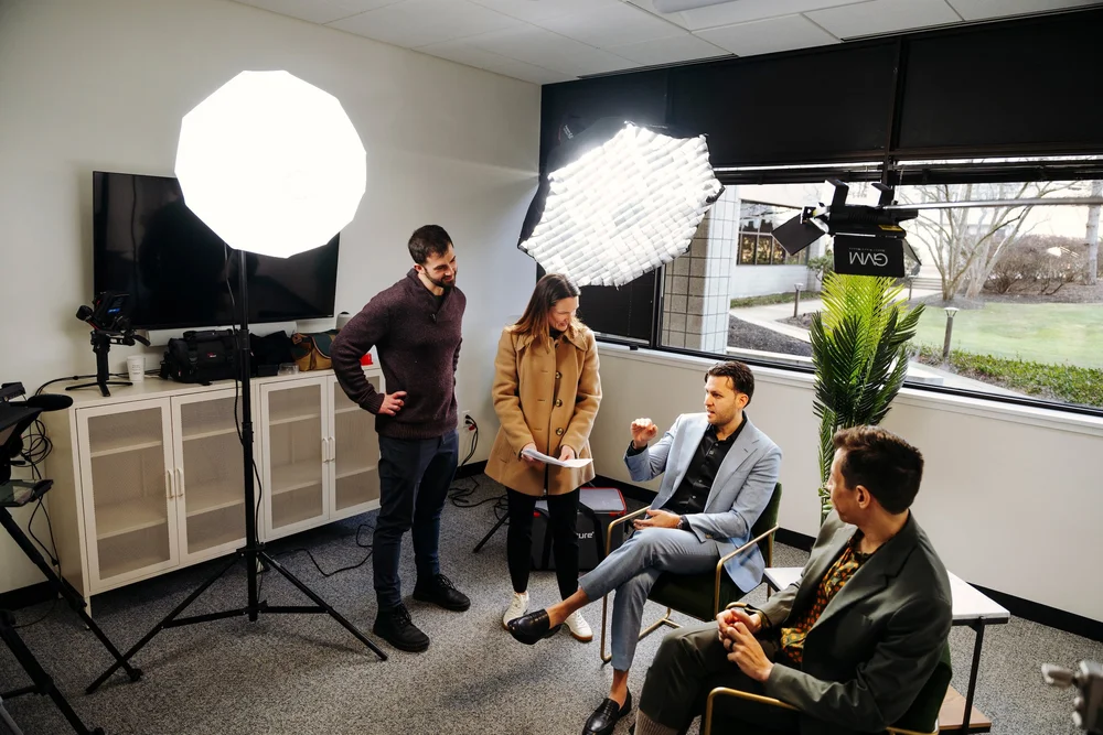 Lenslight Media director and crew preparing clinicians with script review before filming