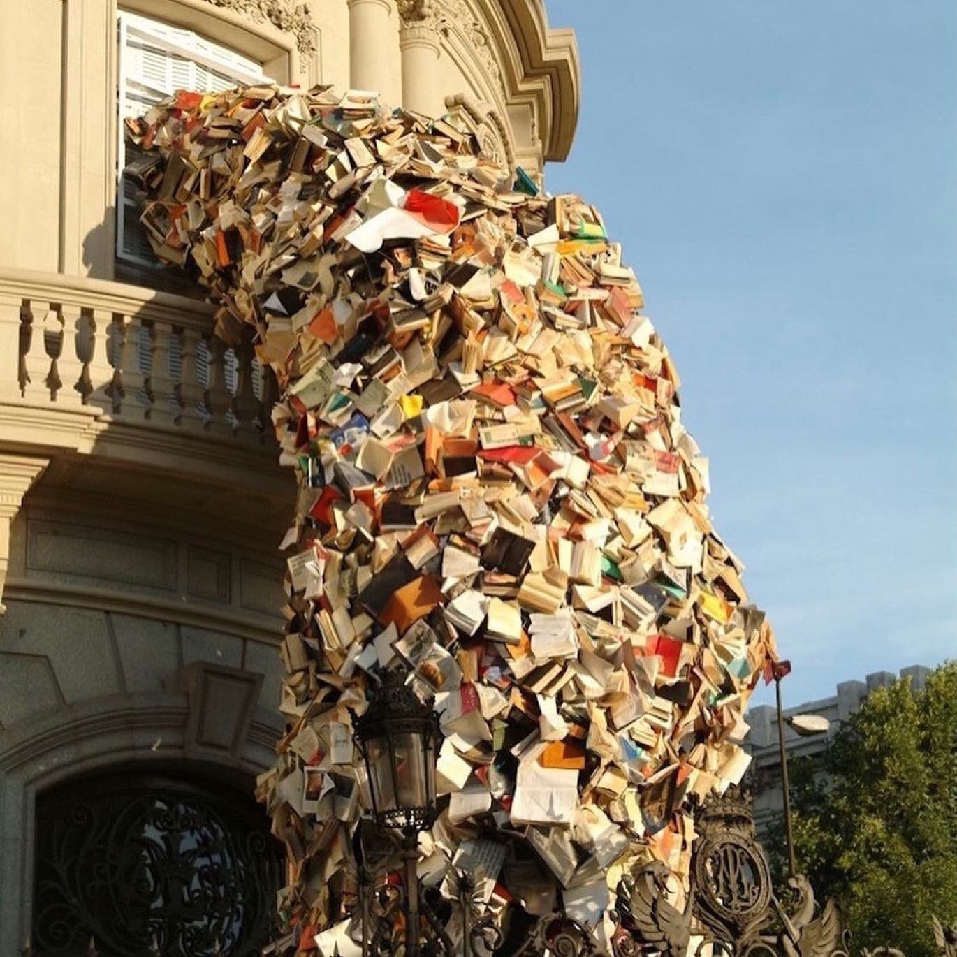 if i were to open a window in here......
.
.
[Photos of Alicia Martin&rsquo;s &ldquo;Casa de America&rdquo; sculpture in Madrid, featuring thousands of books cascading out of a window&hellip; as if the window itself is barfing out a beautiful cascade