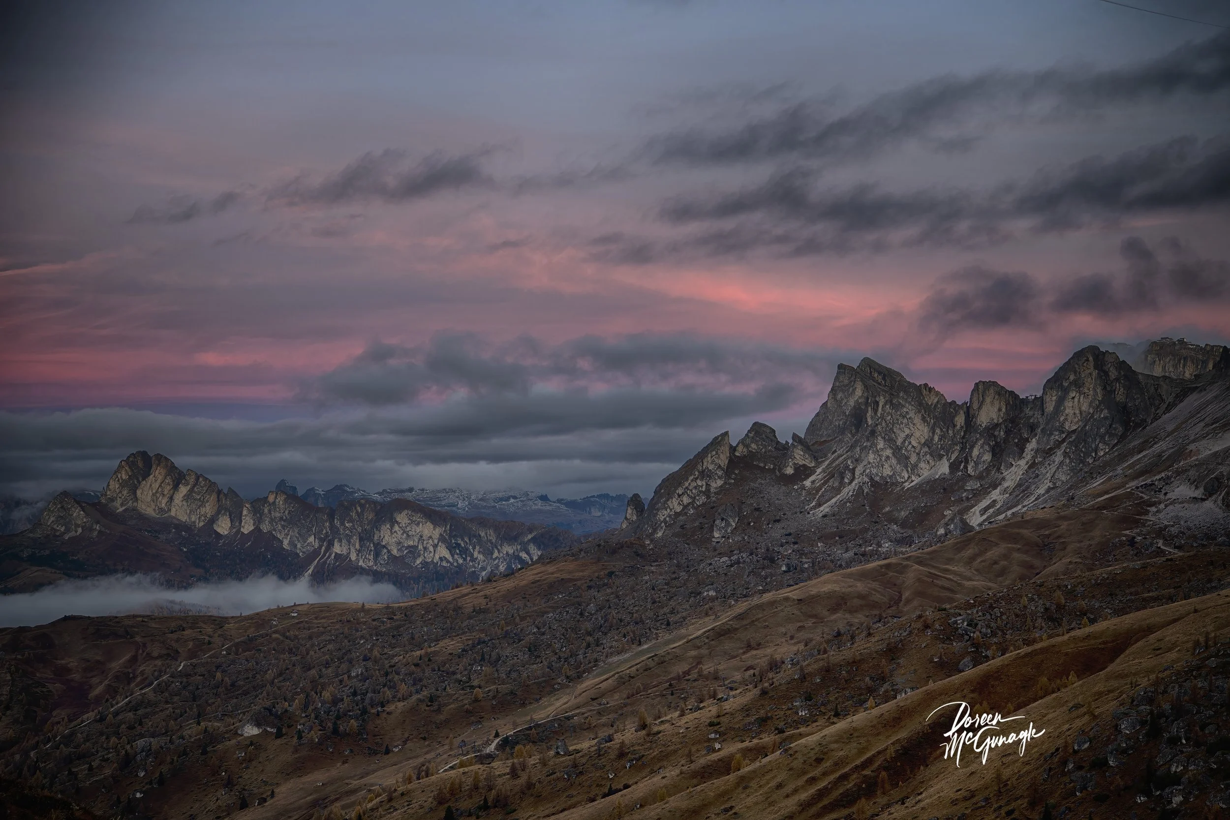 Dawn's Whisper Over Rugged Peaks by Doreen McGunagle