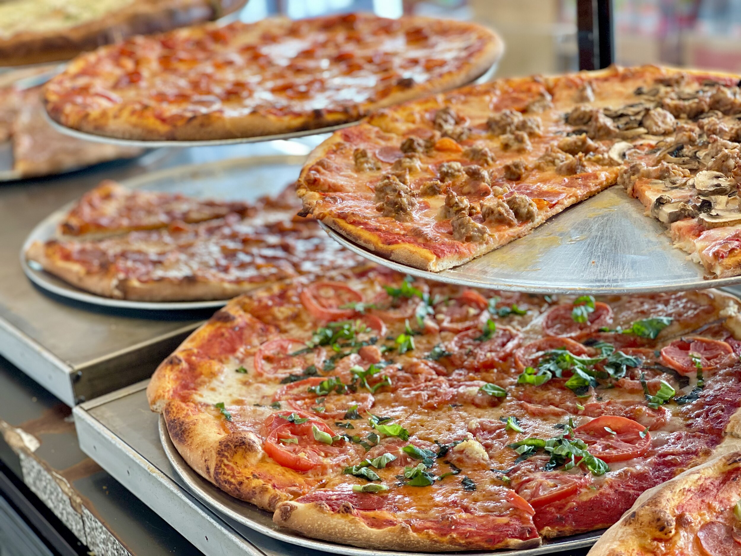assorted pizzas
