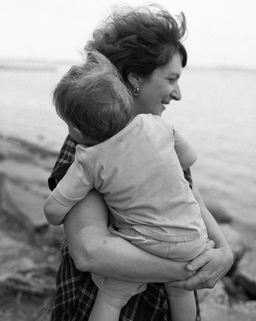 A photo shoot for their grandmother and her grandchildren.