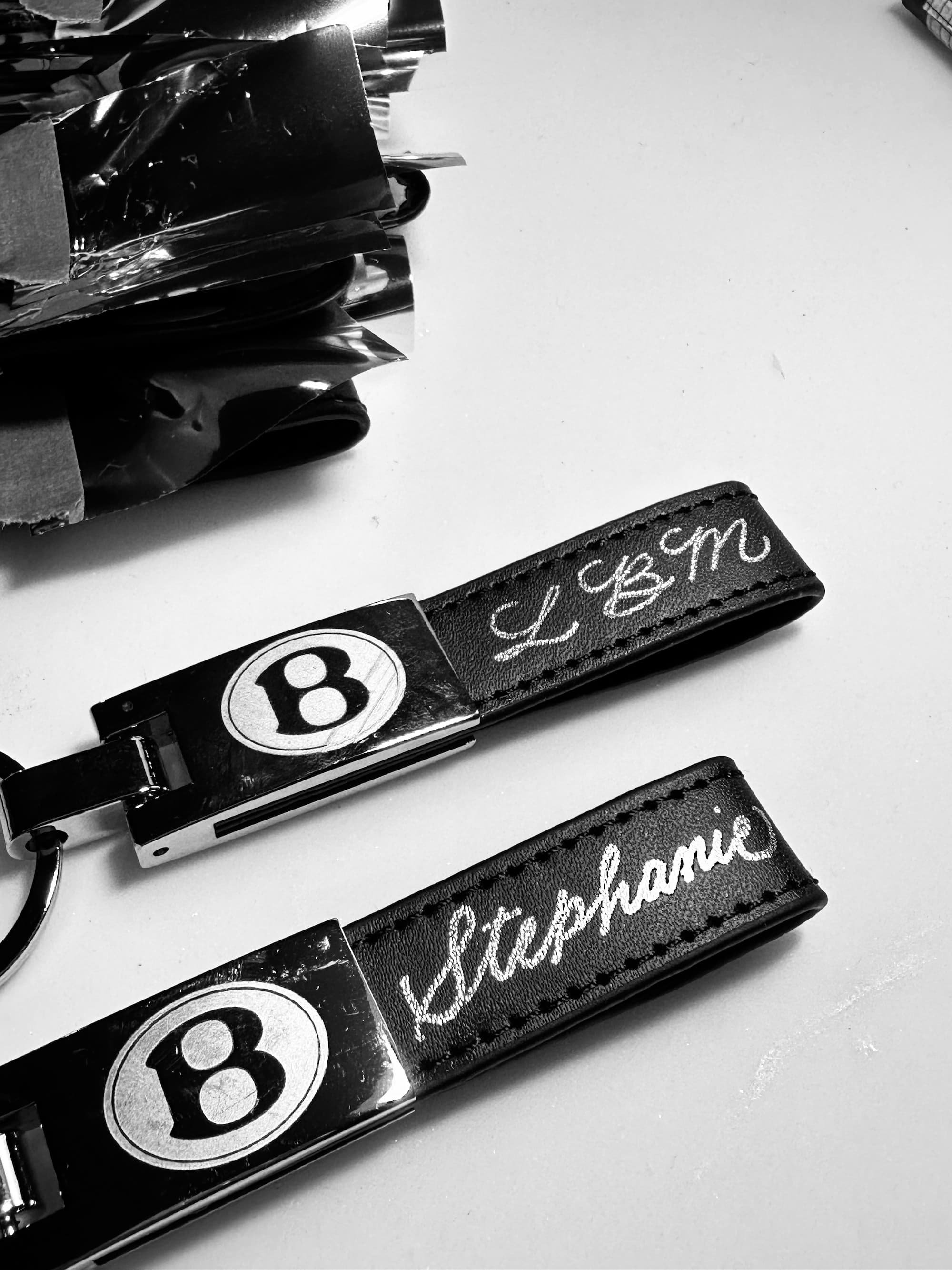 Silver Foiling on Bentley Keychains - Fort Lauderdale, FL