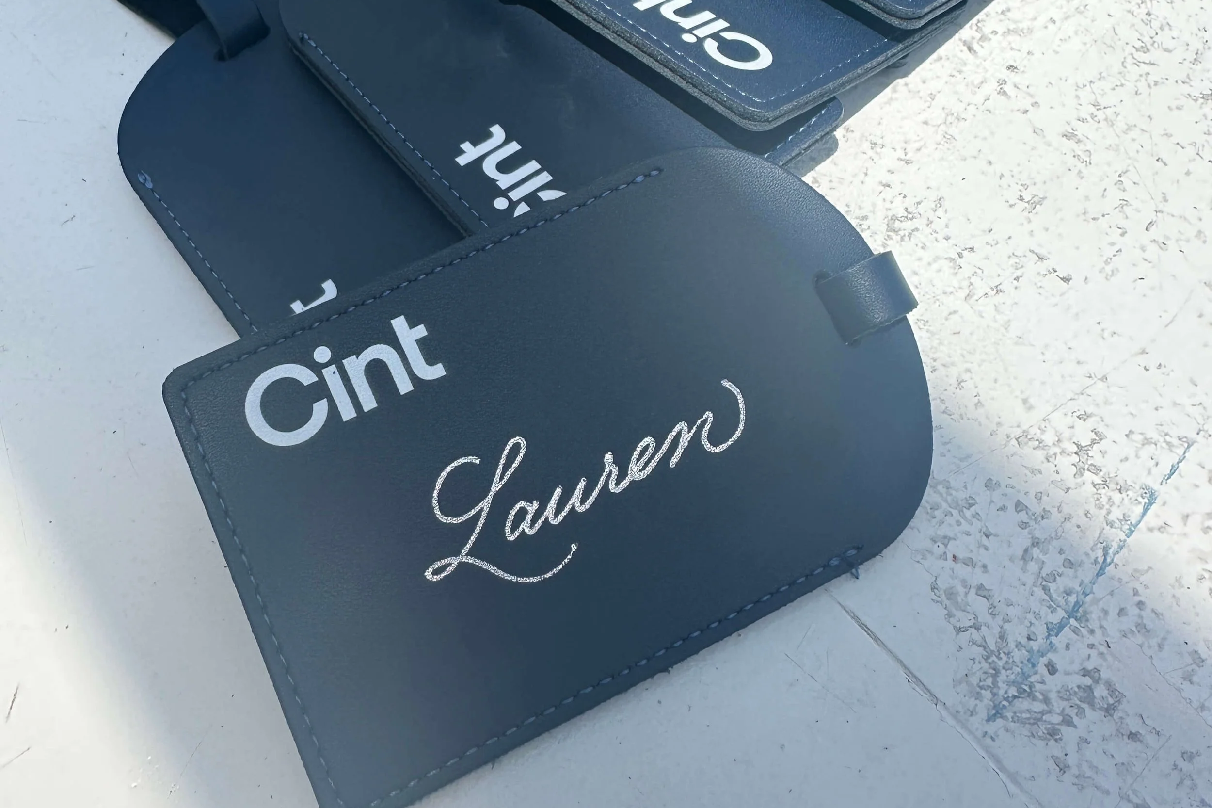 Hot foiling on luggage tag for Cint at Possible Conference Miami