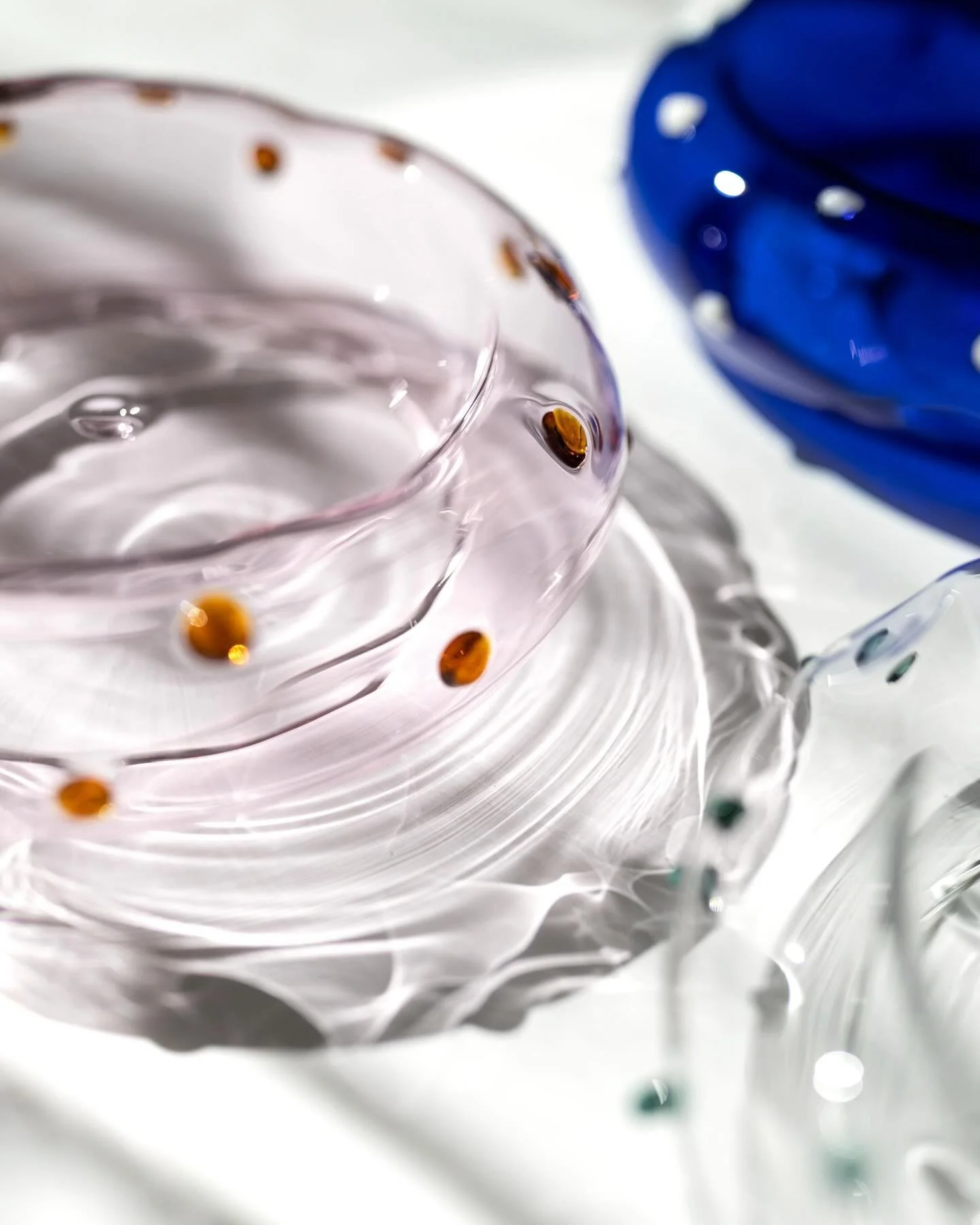 Three colour worlds: sea crystal, salty rose, ocean blue. Each one a different reading of the same Atlantic landscape. Photo by @adalberto_duarte.ph 

#designedinlisbon #lisboa #contemporaryglass #newin #catarinapachecodesign