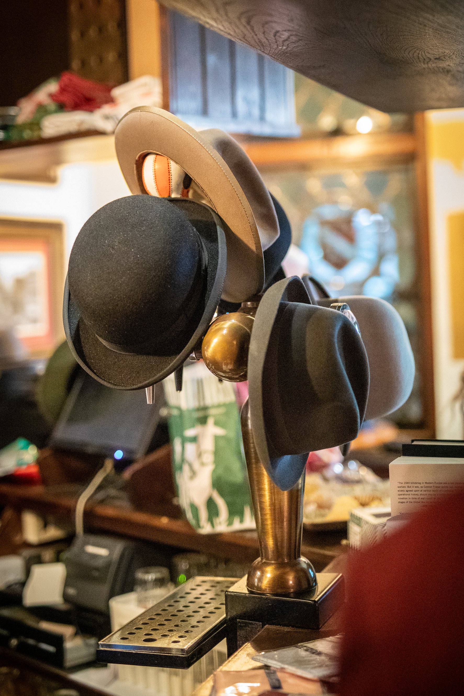 It's become traditional that the beer pump is put into service as a hat stand