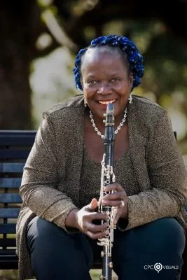 Doreen Ketchens, “Queen Clarinet” with a Street Corner Throne