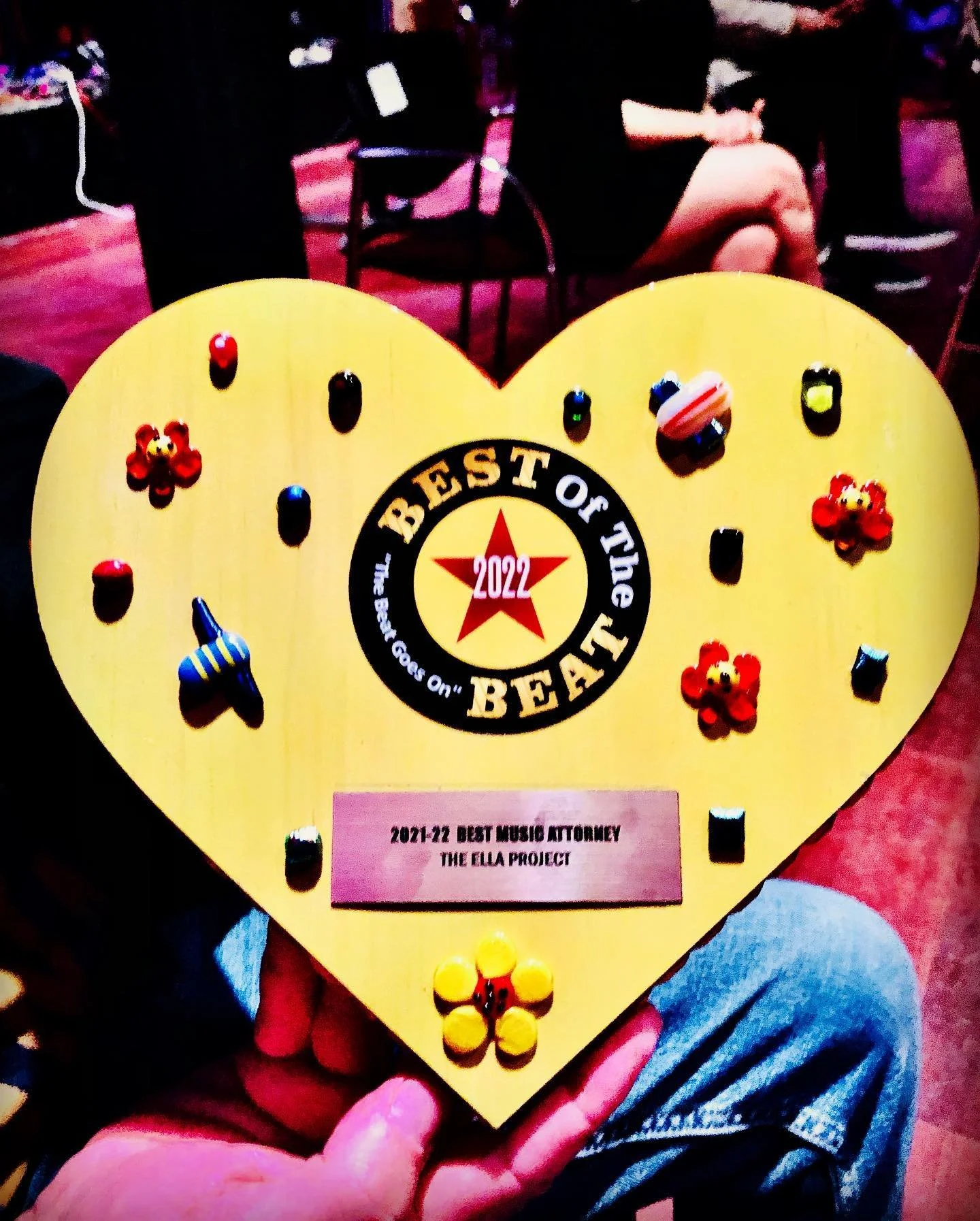 Heart-shaped plaque with stars and flowers, awarded for the Best of the Beat 2022, presented by The Ella Project for Best Music Attorney 2021-22.