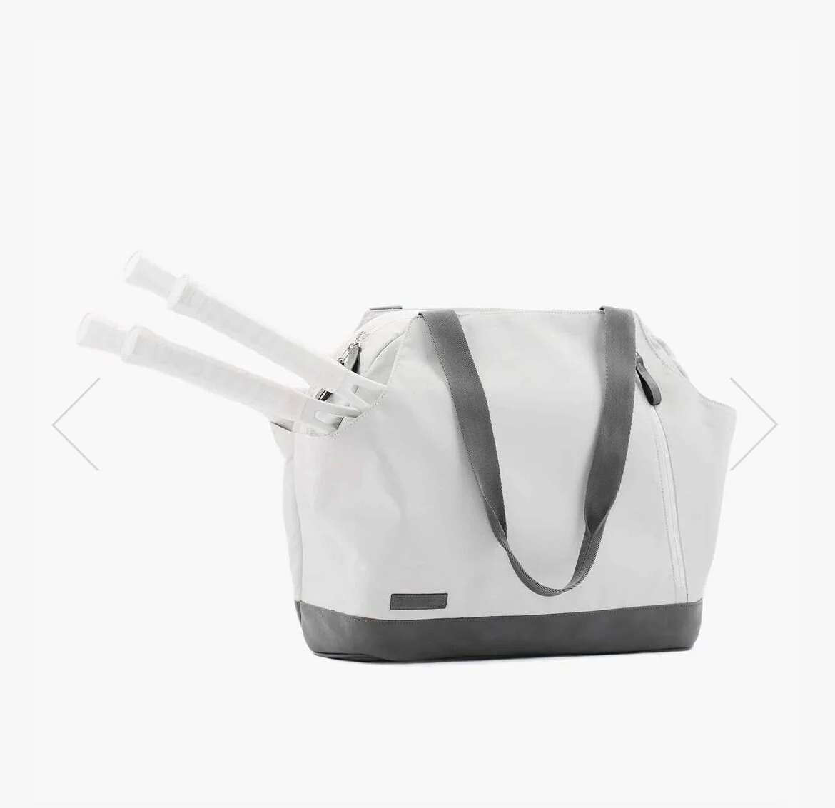 This bag is luxurious and large. It can fit multiple racquets and is the size between a tote and a duffle bag (hence, the name).