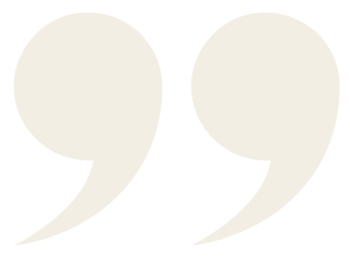 Two large quotation marks on a black background.