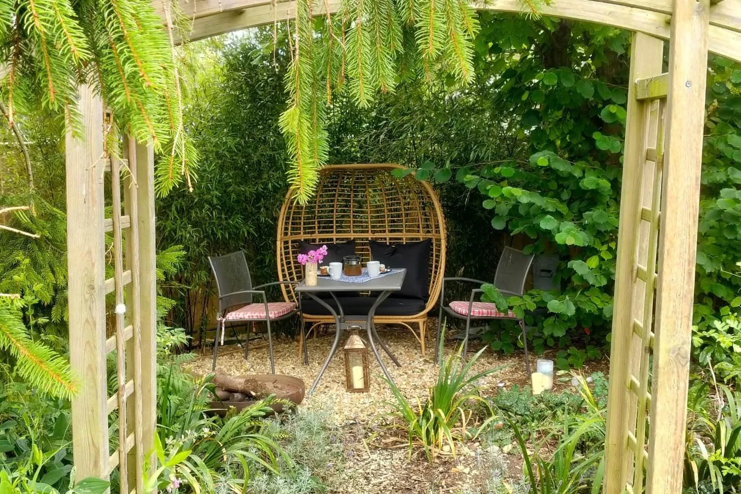 The peaceful, nurturing country fairy garden area at the Stretton home sanctuary, offering a low-stimulus, grounding retreat environment for private sound therapy students.