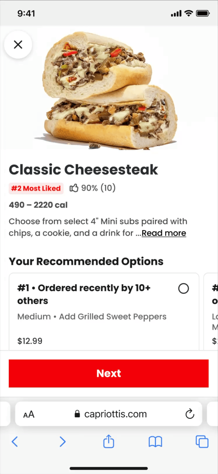 A sandwich called Classic Cheesesteak, made with sliced beef, melted cheese, peppers, and onions in a hoagie bun, displayed on a white background.