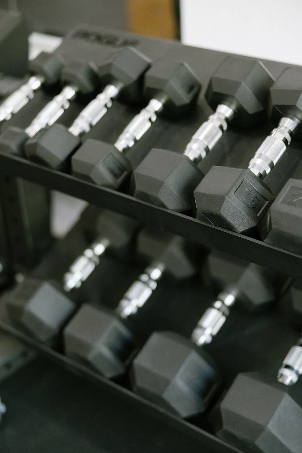 An image of free weights in Elena Lee's workout studio in Dallas, Tx.
