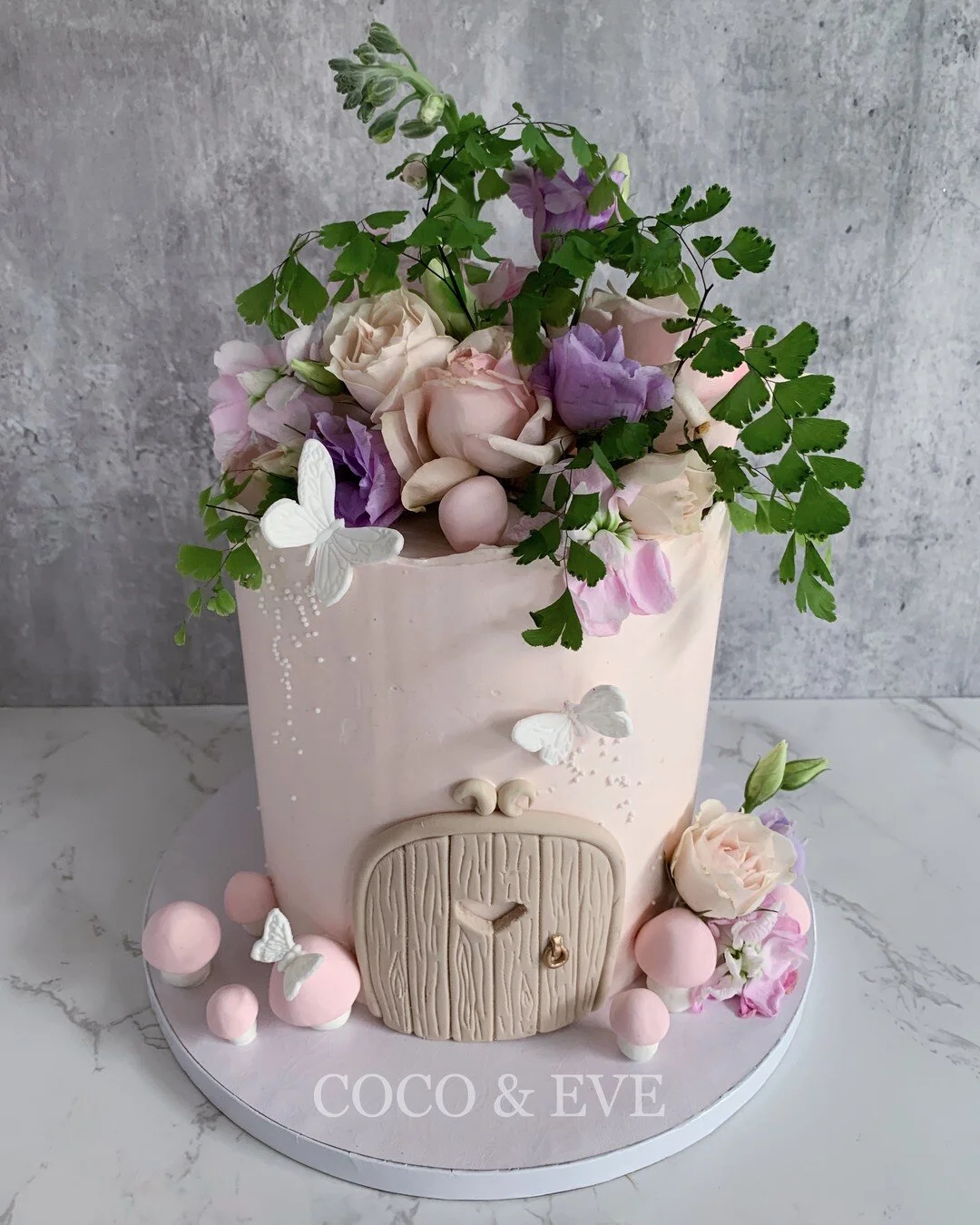 Have you seen a fairy door before IRL? A fairy door is a miniature door, usually set into the base of a tree, behind which may be small spaces where people can leave notes, wishes, or gifts for the &quot;fairies&quot;. 

When a lovely mama approached