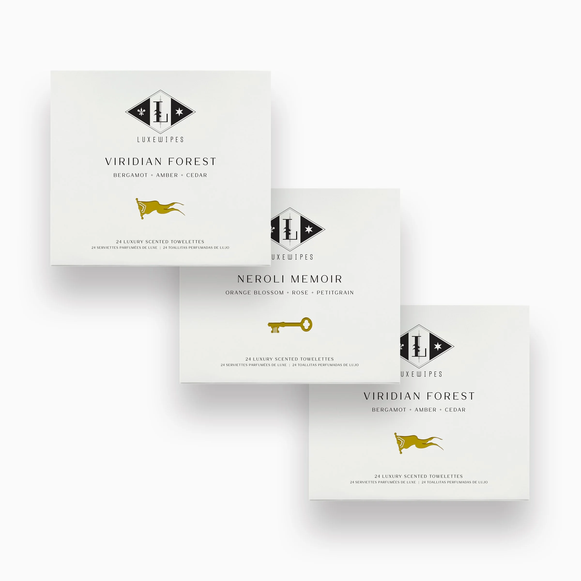 Front view of LUXEWIPES Viridian Forest, Neroli Memoir, and Viridian Forest boxes, each with 24 individually wrapped oxford-woven cotton wet cleansing towelettes for elevated gifting and self-care.