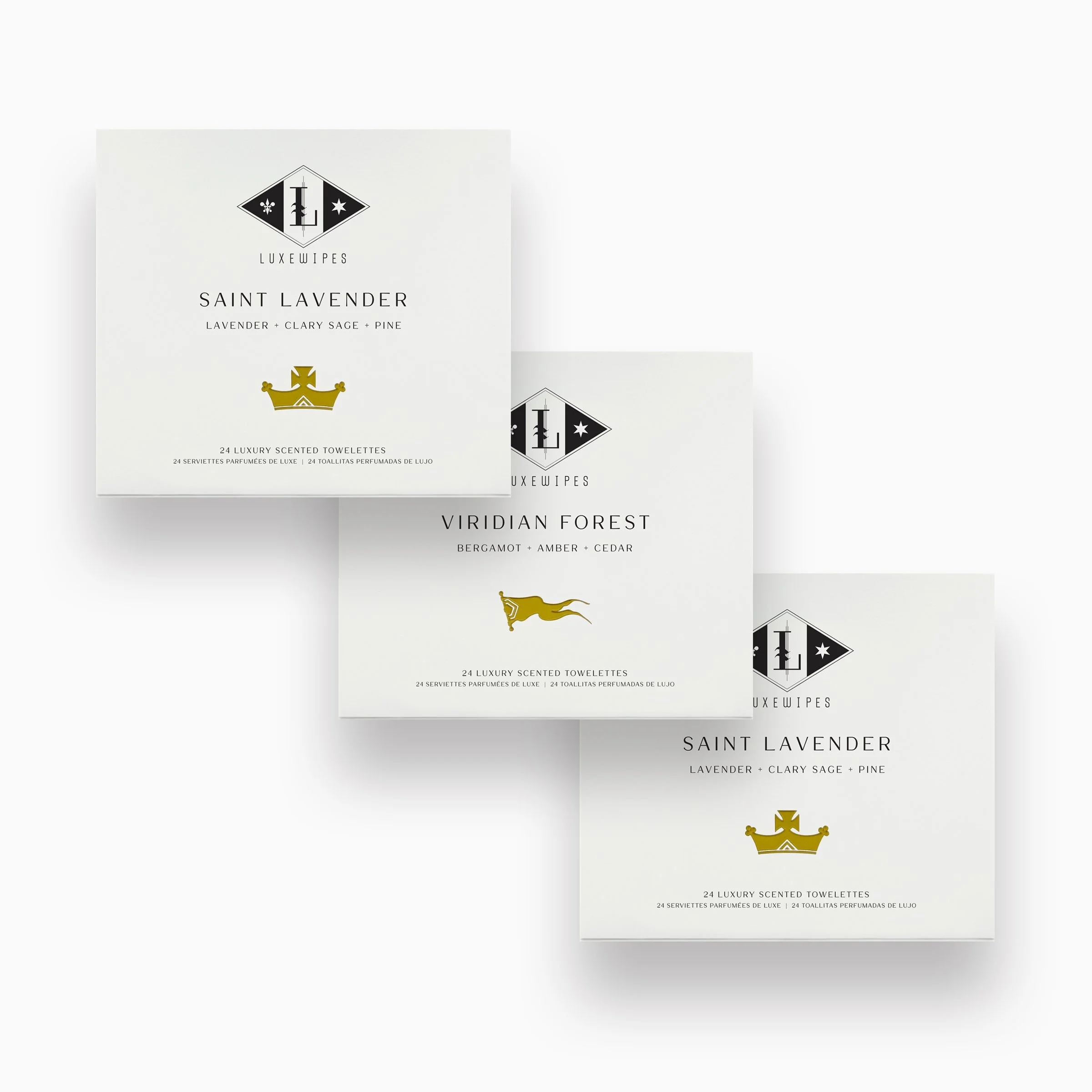 Front view of LUXEWIPES Saint Lavender, Viridian Forest, and Saint Lavender boxes, each with 24 individually wrapped oxford-woven cotton wet wipes. Elevate your self-care and gifting game.