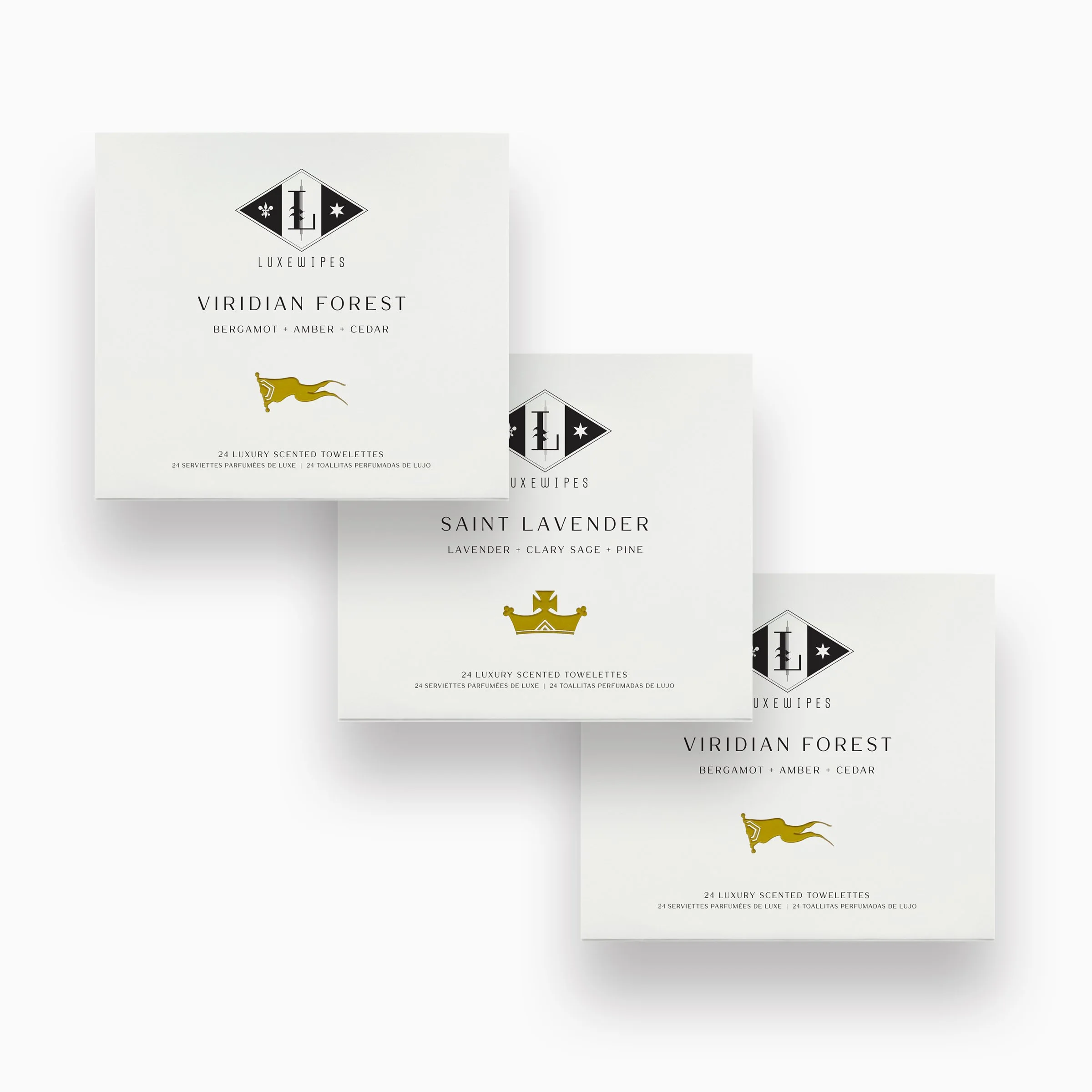 Front view of LUXEWIPES Viridian Forest, Saint Lavender, and Viridian Forest boxes, each with 24 individually wrapped oxford-woven cotton wet wipes for elevated gifting and self-care.