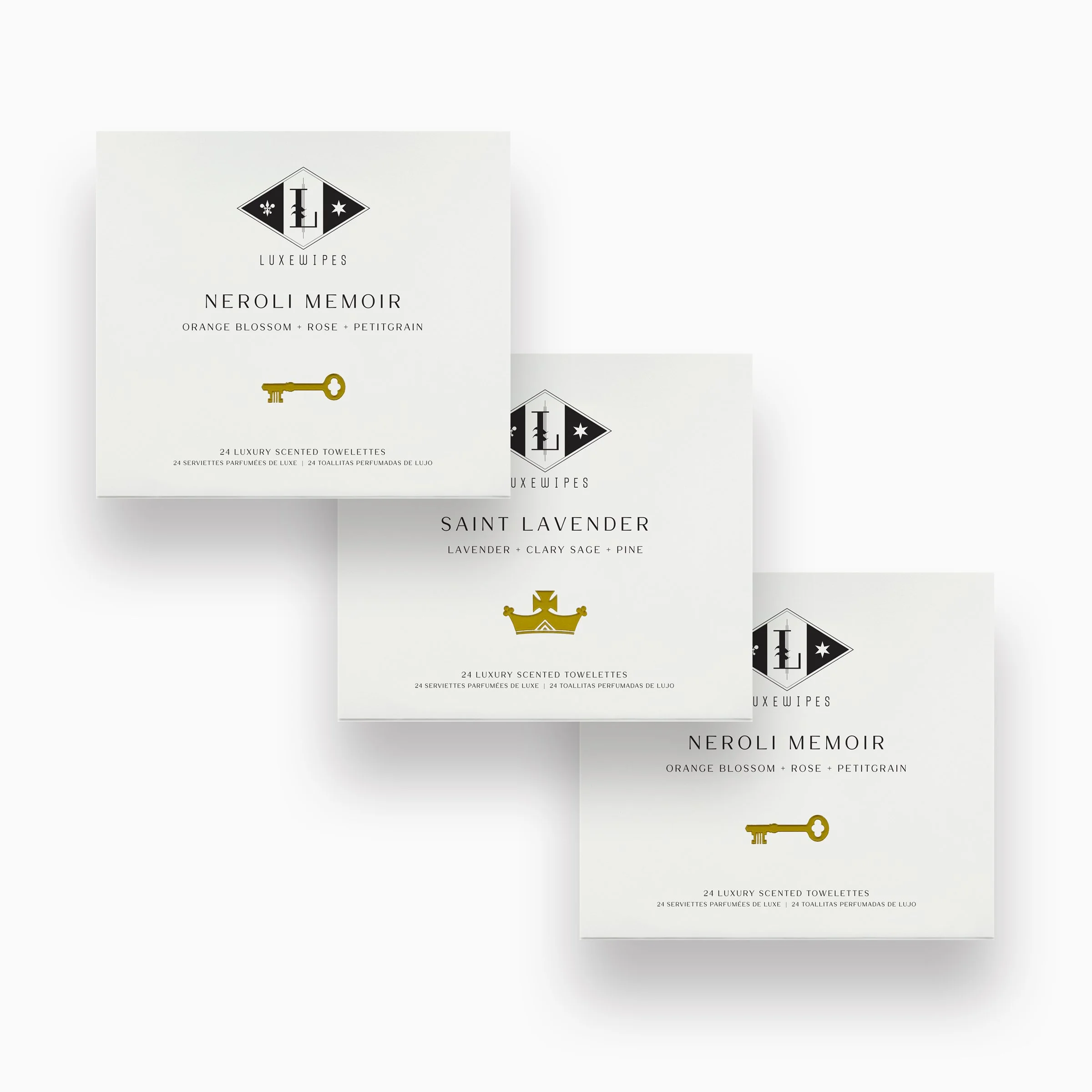 Front view of LUXEWIPES Neroli Memoir, Saint Lavender, and Neroli Memoir boxes, each with 24 individually wrapped oxford-woven cotton wet wipes, designed for a luxurious self-cleansing experience.